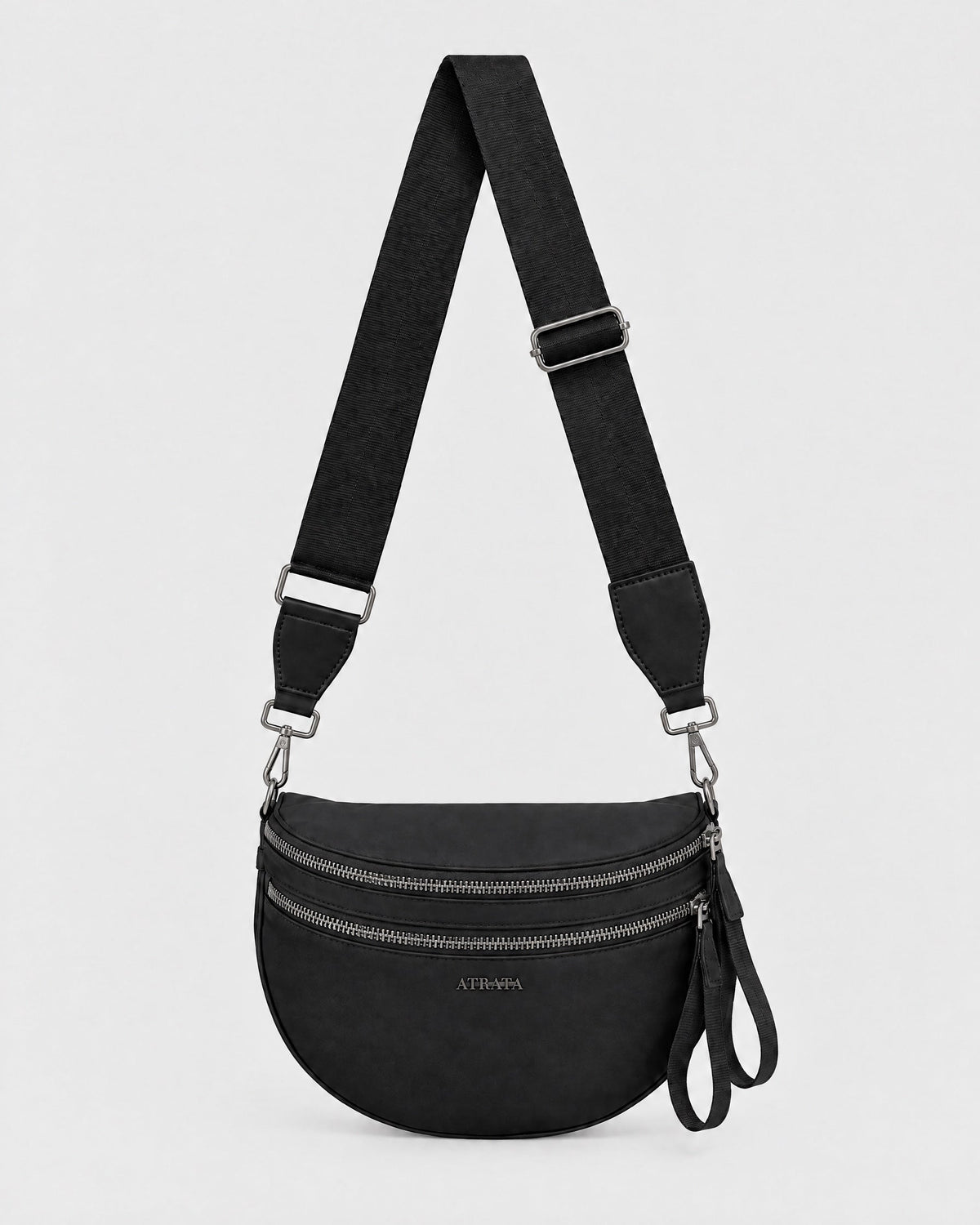 The Kelaino Crossbody, front view in black