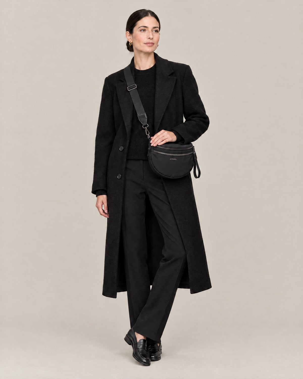 The Kelaino Crossbody, worn across the chest, full length