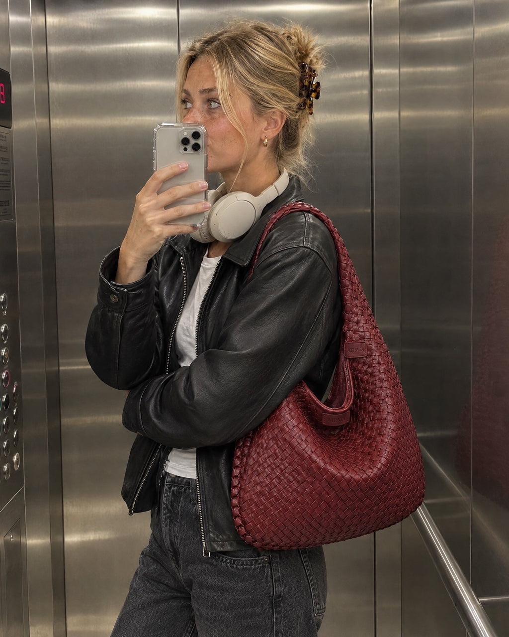 The Ember Bag, mirror selfie with the bag on her shoulder