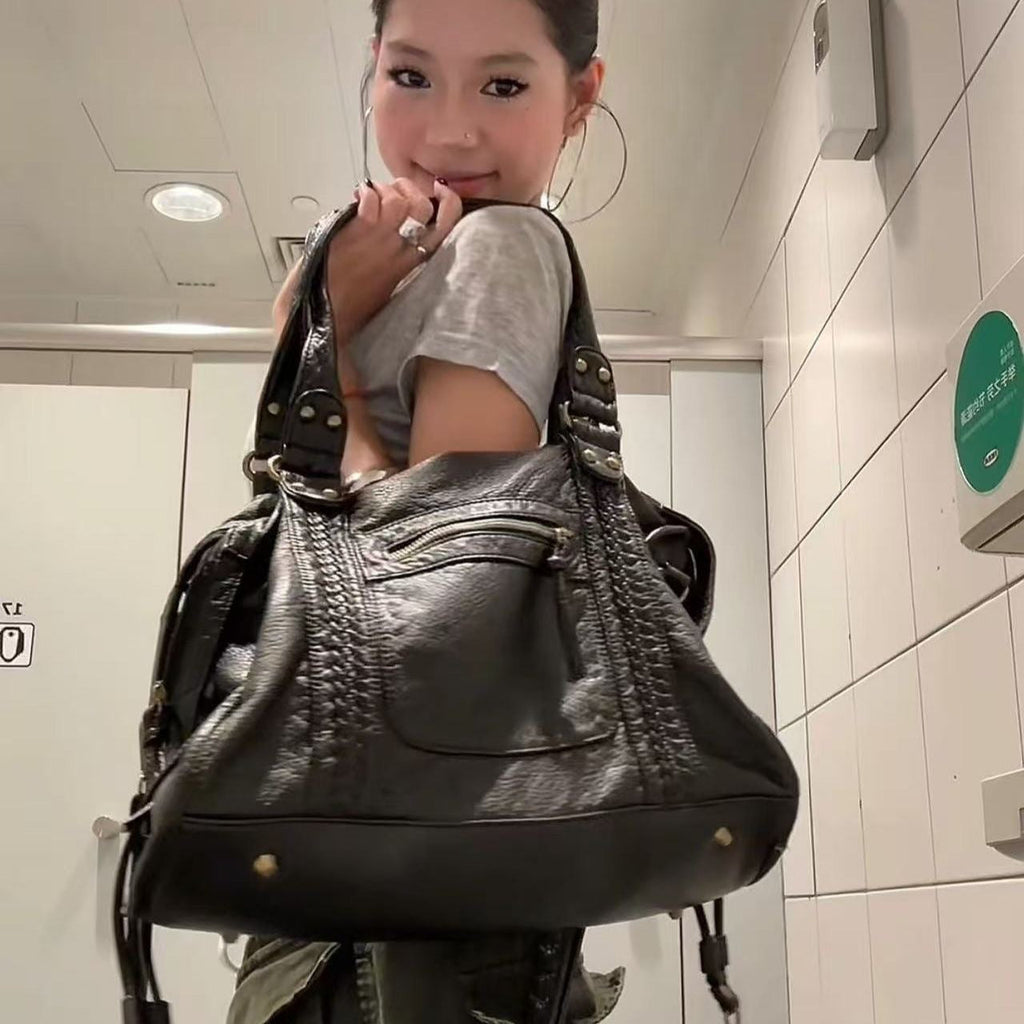 The Moonlit Bag, held on the shoulder, close up
