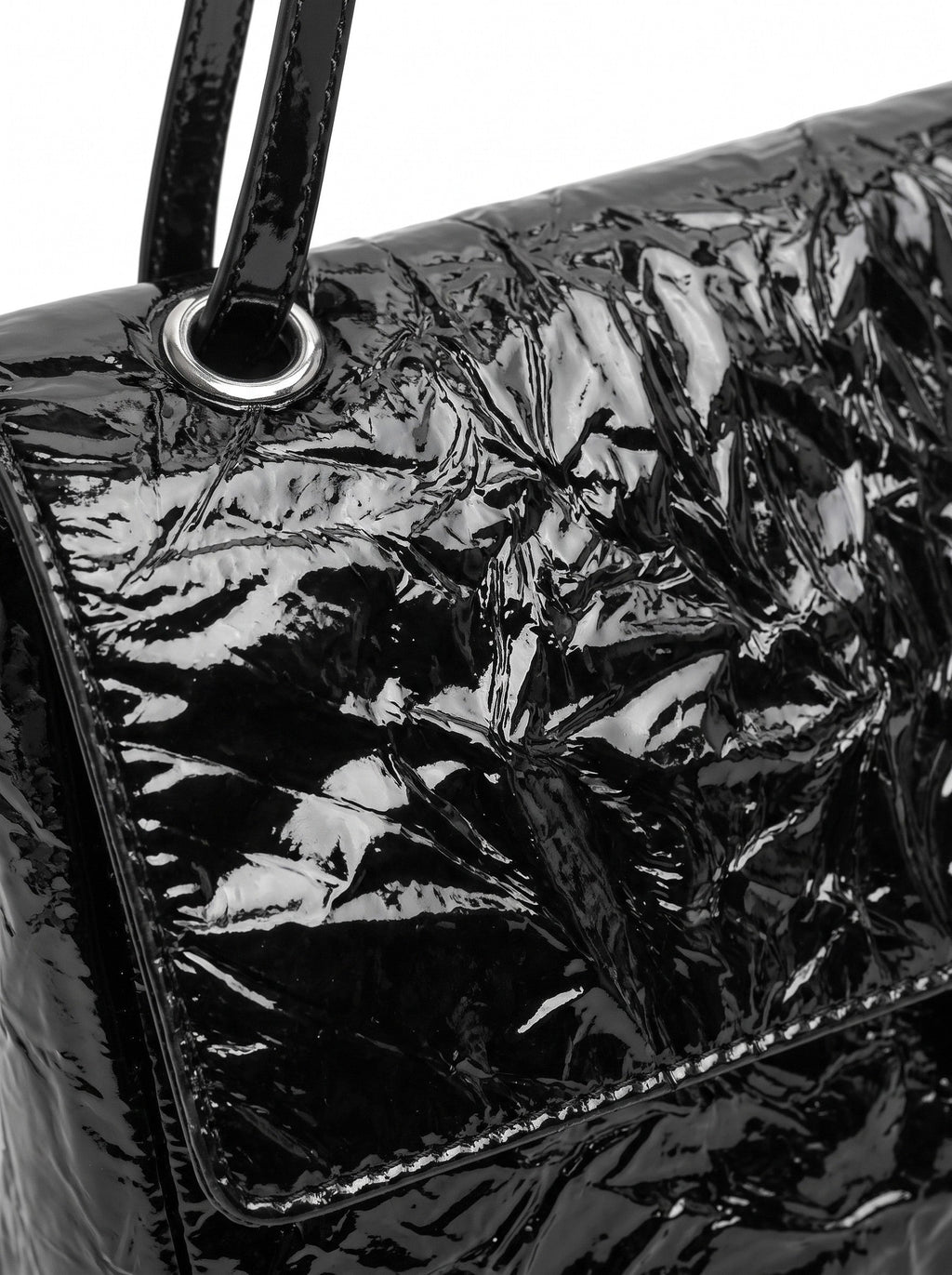 The Statement Flap Bag, close-up of the crinkled glossy leather