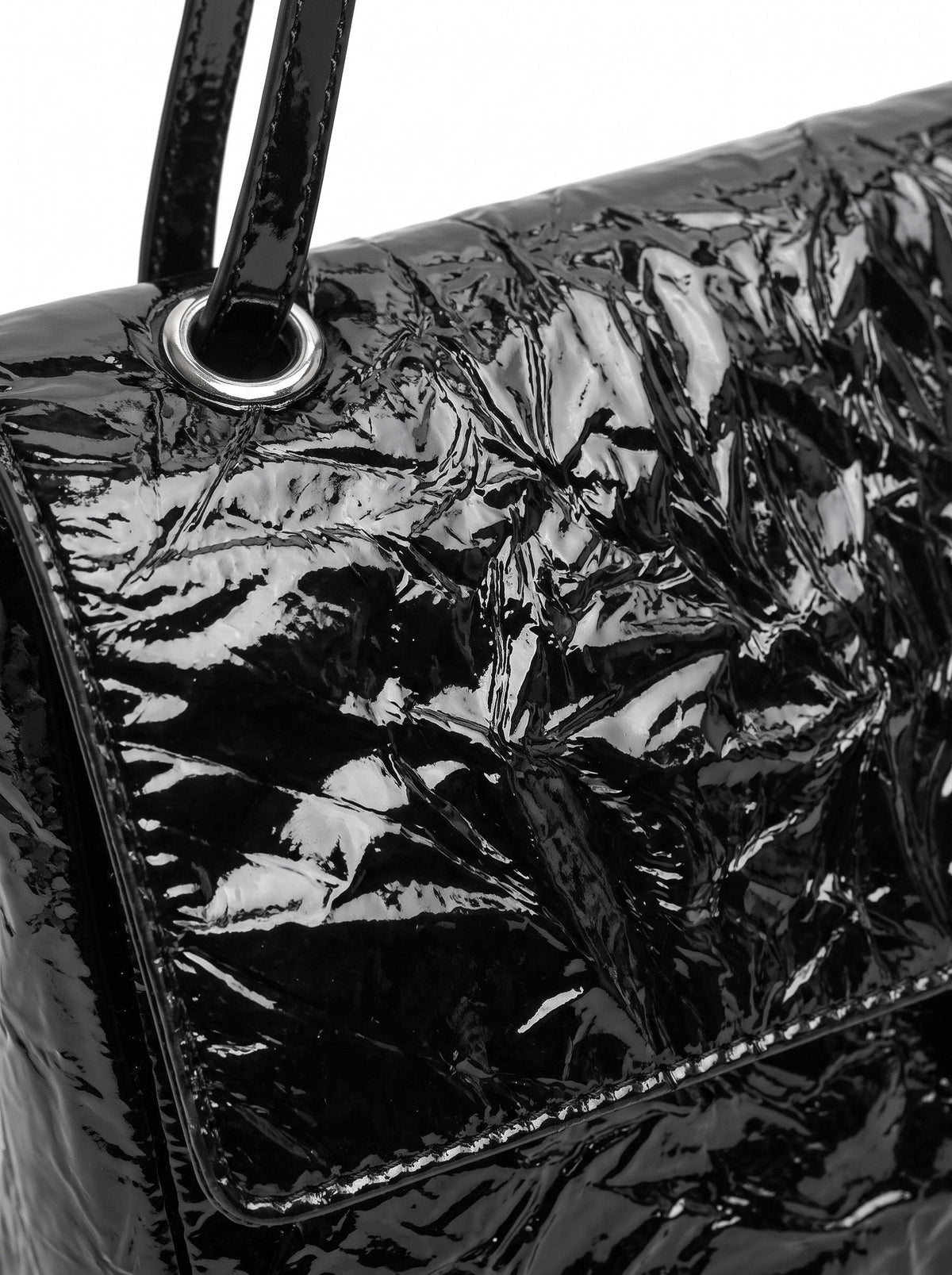 The Statement Flap Bag, close-up of the crinkled glossy leather