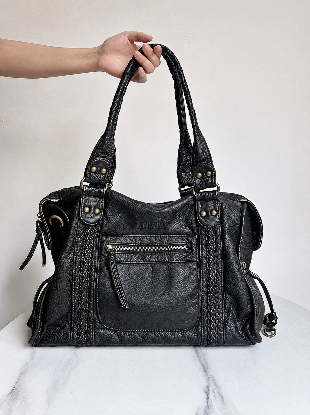 The Moonlit Bag, carried by the braided handles
